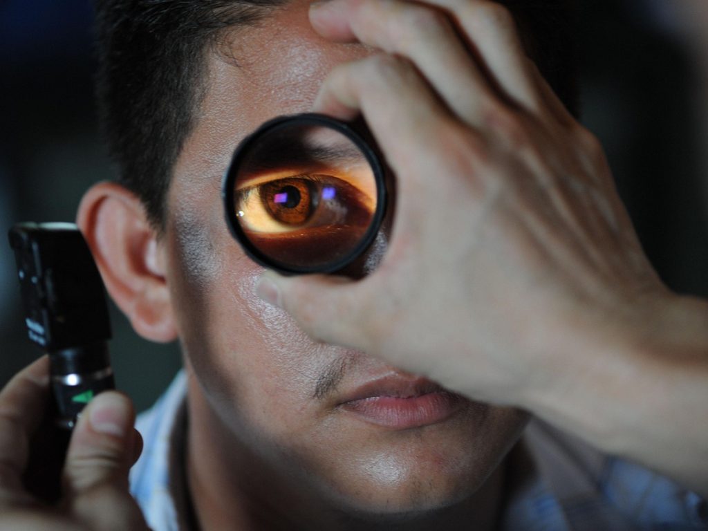 Optometrist, doctor, patient — Skilled Health heart Instruments