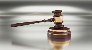 Gavel, auction, hammer — Understand Who Pays Legal Fees for Eviction to Avoid Surprises